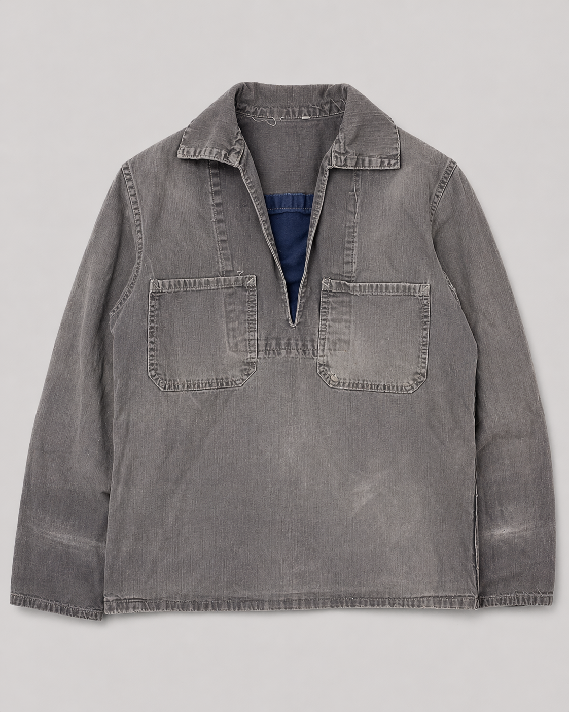 Gray cotton shirt with collar on a light gray background french blue vareuse fisherman marin sailor sailing blouse smoke smock jacket overshirt 1960s