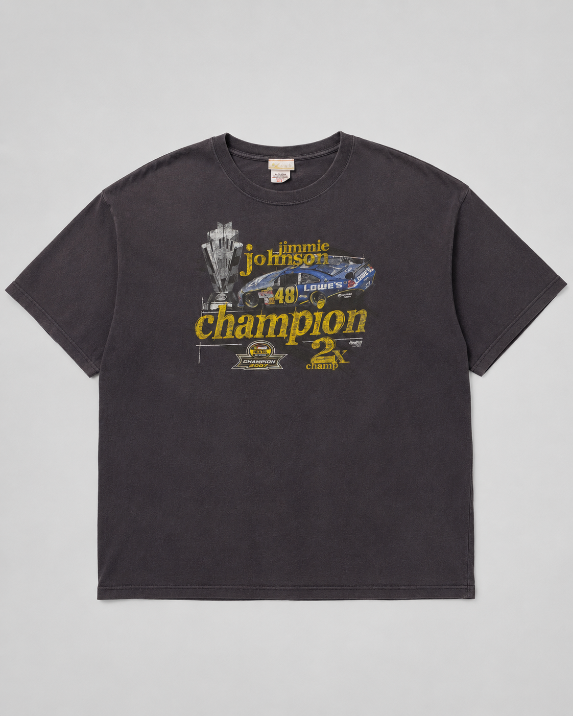 Black t-shirt with racing-themed graphic and text 1990s racing NASCAR Jimmie Johson pilote 
